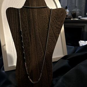 Vintage 48inch long silver tone necklace.  11inches of mini silver detail tabs.